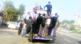 An overloaded minibus plying on the national highway in Samba.