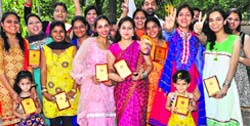 Students in a jubilant mood after receiving prizes at the State Council of Educational Research and Training, Sector 32, in Chandigarh on Thursday. Tribune photo