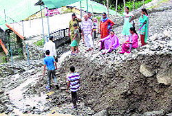 Houses damaged because of the reckless cutting of hills by a power company at Deol village in Palampur