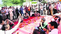 The Joint Civil Society, Doda, observes black day in Doda on Thursday. 