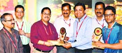Dr Mandeep K Bhandari, Chief Executive Officer, Shri Mata Vaishno Devi Shrine Board, felicitates winners and runners-up of the shrine board annual staff sports meet during a function in Katra on Thursday. A Tribune photograph