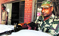 A CRPF jawan deployed outside the EVM strong room in Jalandhar on Thursday
