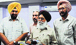 Dr Surjit Pattar addresses media persons in Ludhiana on Thursday