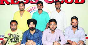 Youths who recently returned to Punjab from Riyadh hold a press conference in Hoshiarpur on Thursday.