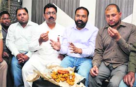 BSP candidate Sukhwinder Kotli with party workers in Jalandhar on Thursday.