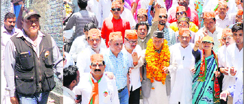 KC Singh Baba, sitting Congress MP from Nainital; and (right) BJP candidate Bhagat Singh Koshiyari. 