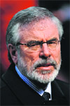 Irish republican leader Gerry Adams was arrested over the murder of a woman in 1972