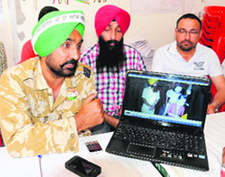 AAP candidate Jassi Jasraj addresses a press conference at the party office in Bathinda on Friday. 