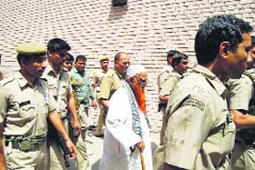 LeT operative Abdul Karim Tunda being taken to the court by a Delhi Police team at Rohtak on Friday