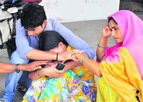 Family members of Jaswinder wail outside a private hospital in Sector 12 of Karnal on Friday