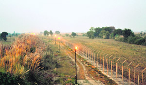 The floodlit international border in the RS Pura sector of Jammu district.