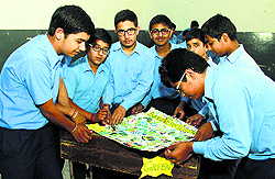 Students prepare a chart during Eco-Friendly Week at BVM School
