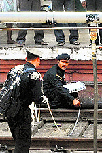 National Security Guard men inspect the scene of the blasts in Chennai on Friday