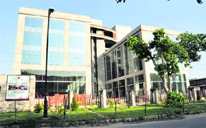 Work in style: Berkeley Square (top) and Godrej Eternia commercial complexes in Indistrial Area Phase I in Chandigarh tribune photos: parvesh chauhan