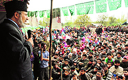 Peoples Democratic Partys senior leader Muzaffar Hussain Beigh addresses a gathering during an election rally in Seeray Warpoor, 40 km north of Srinagar