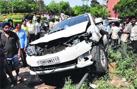 The damaged Toyota Fortuner that collided with a car at the Sectors 43/44 roundabout in Chandigarh on Saturday
