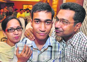 Prashant Mittal, along with his parents, in a jubilant mood in Chandigarh on Saturday