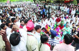 Supporters of Samajwadi Party leader Azam Khan during a protest rally against the Election Commission at Jantar Mantar in New Delhi on Saturday