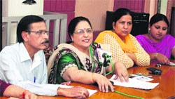 Members of the BJP Mahila wing address the media in Jalandhar on Saturday. Photo: Sarabjit Singh