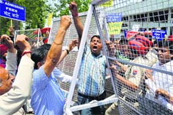 Office-bearers of the Parents Association protest outside the Deputy Commissioners office on Saturday. Photo: Inderjeet Verma