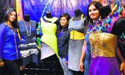 Students of the Sportking Institute of Fashion and Technology strike a pose with dresses designed by them for an exhibition at Sutlej Club in Ludhiana. Photo: Inderjeet Verma