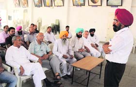 Discussing democracy: Jagdish Ghai, a social worker, speaks at a seminar held to discuss threats to democracy at Teachers Home in Bathinda on Sunday