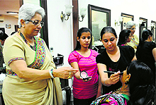 Salochna Ahuja (left) with her hearing impaired students at her salon in Sector 8, Chandigarh