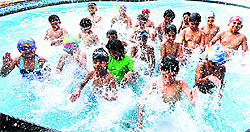 With the temperature soaring during last week, children beat the heat in a swimming pool at Sector 23, Chandigarh