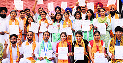 Students in a jubilant mood after receiving diplomas during a convocation at the Pracheen Kala Kendra in Sector 71, Mohali, on Sunday