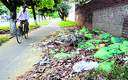 Garbage strewn on a cycle track not only emits fould stench but also puts cyclists at the receiving end