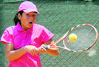 Agrima Tiwari in action during a tennis match at DAV Public School, Sector 8, Chandigarh