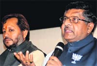 BJP leader Ravi Shankar Prasad addresses a press conference in Dehradun on Sunday. A Tribune photograph