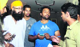 Harvinder Singh, husband of Pradeep Kaur, talks to media in Jalandhar