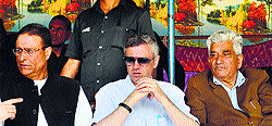 Chief Minister Omar Abdullah with NC candidate Shariefuddin Shariq (R) and Transport Minister Choudhary Mohammad Ramzan (L) at a poll rally in Kupwara district on Sunday