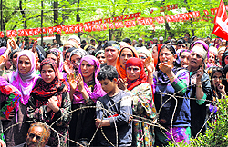 Women attend an election rally being addressed by Union Minister and National Conference president Farooq Abdullah in Baramulla district on Sunday