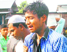 An inconsolable relative of one of the people killed by Bodo militants in Baksa district, on Sunday.