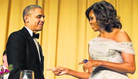 First lady Michelle Obama with Barack Obama during the White House Correspondents Association Dinner in Washington.