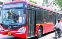 A view of the city bus plying on a road in Amritsar. Photo: RK Soni