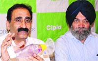 Dr Naresh Grover and Dr AS Bhatia address mediapersons on the World Asthma Day in Amritsar on Monday. Photo: Vishal Kumar