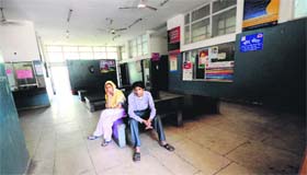 Long wait: Patients at the dispensary at Ramdarbar Colony in Chandigarh