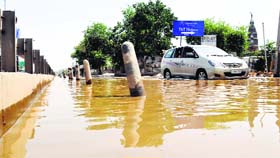 The waterlogged Hero Honda chowk due to overflow of sewage in Gurgaon on Sunday .
