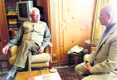 Vice Chancellor of the Sher-e-Kashmir University of Agricultural Sciences and Technology Tej Pratap calls on Governor NN Vohra at Raj Bhawan in Srinagar on Monday. A Tribune photograph