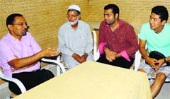 Chandigarh-based colorectal surgeon Dr Pankaj Garg (extreme left) with his patients. Tribune photo: Manoj Mahajan