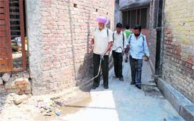 MC staff carry out fogging in the Kot Mahna Singh area in Amritsar on Tuesday