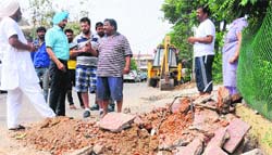 Residents at the site in Sector 71, Mohali. Tribune photo