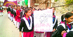 Students from Sanatan Dharm Girls Inter-College hold an awareness rally in Mussoorie on Tuesday