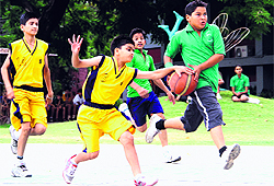A match in progress during the District Sub-Junior Basketball Championship played at Welham Boys School in Dehradun on Tuesday