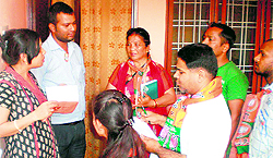 BJP workers seek supprt for their canddiate in Nimboowala ward of Gadi Cantt in Dehradun on Tuesday