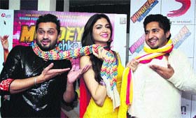 Roshan Prince, Simran Kaur Mundi and Jassi Gill perform on the music release of the upcoming Punjabi film Mundeyan Ton Bach Ke Rahin in Jalandhar on Tuesday