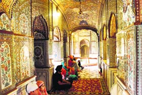 Golden glory: A view of the restored wall paintings in the 'parkarma' at the Golden Temple's first floor in Amritsar